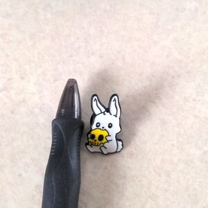 4/$20 tiny rabbit holding skull white rabbit enamel pin.